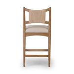 A curved back wrapped and textural woven paper cord take this everyday counter stool to new heights. Natural nettlewood frames a linen-blend seat for a clean look Amethyst Home provides interior design, new home construction design consulting, vintage area rugs, and lighting in the Calabasas metro area.