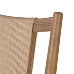 A curved back wrapped and textural woven paper cord take this everyday counter stool to new heights. Natural nettlewood frames a linen-blend seat for a clean look Amethyst Home provides interior design, new home construction design consulting, vintage area rugs, and lighting in the Monterey metro area.