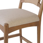 A curved back wrapped and textural woven paper cord take this everyday counter stool to new heights. Natural nettlewood frames a linen-blend seat for a clean look Amethyst Home provides interior design, new home construction design consulting, vintage area rugs, and lighting in the Seattle metro area.