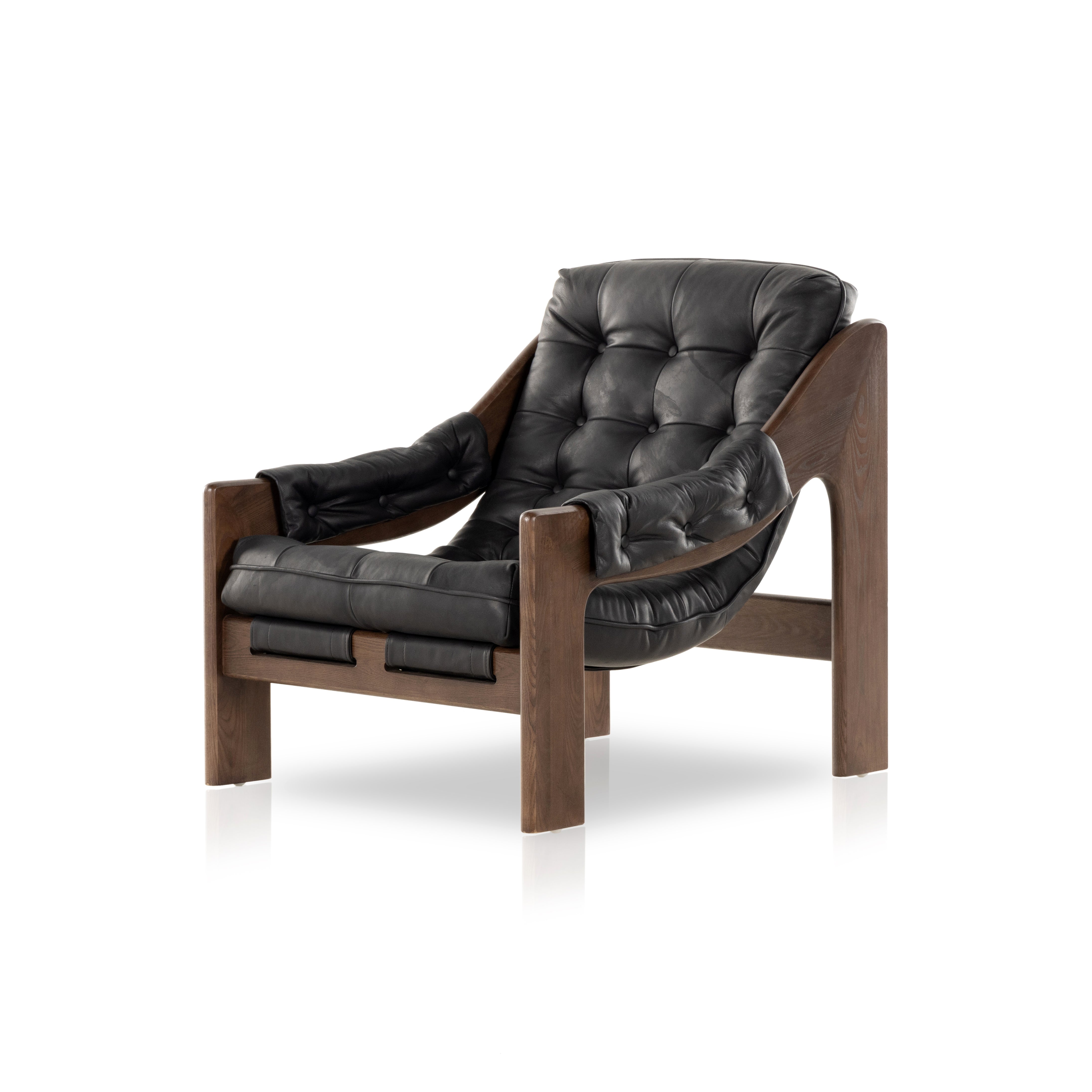 Featuring Halston Black Leather Chair by Four Hands at Amethyst Home. Featured in one of our recent home tours -- the Halston leather chair is the ultimate in comfort and surprised everyone who sat in it.  It has a hammock sling style construction that just feels sooo right.
Overall Dimensions: 30"W x 34.25"L x 32"HMaterials: Top Grain Leather, Solid AshSe. Amethyst Home provides interior design, new home construction design consulting, vintage area rugs, and lighting in the Des Moines metro area.