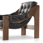 Featuring Halston Black Leather Chair by Four Hands at Amethyst Home. Featured in one of our recent home tours -- the Halston leather chair is the ultimate in comfort and surprised everyone who sat in it.  It has a hammock sling style construction that just feels sooo right.
Overall Dimensions: 30"W x 34.25"L x 32"HMaterials: Top Grain Leather, Solid AshSea. Amethyst Home provides interior design, new home construction design consulting, vintage area rugs, and lighting in the San Diego metro area.
