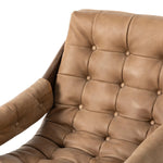 Featuring Halston Palermo Drift Chair by Four Hands at Amethyst Home. Dramatically tufted and angled for comfort, this Seventies-inspired sling seat is made from thick-cut top-grain leather in an earthy taupe, with wide brown ash framing. A plump, pronounced grain accentuates leather's natural markings for a supple, lived-in look.Overall Dimensions: 30.00. Amethyst Home provides interior design, new home construction design consulting, vintage area rugs, and lighting in the Kansas City metro area.