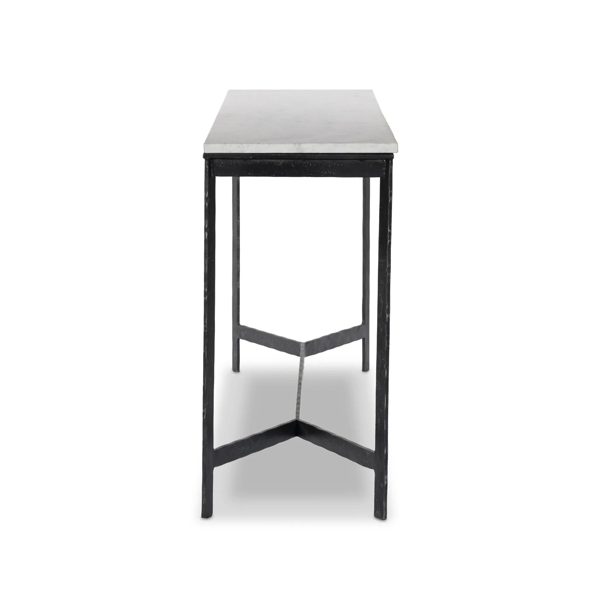Featuring Hammered White Marble Iron Console Table by Four Hands at Amethyst Home. An open console table pairs a hand-hammered black iron base with a smooth white marble top, crafting a minimalist look with contrast. An open design creates endless possibilities for your media display and storage, or even styled in an entryway. Overall Dimensions: 78.00"w x. Amethyst Home provides interior design, new home construction design consulting, vintage area rugs, and lighting in the Des Moines metro area.