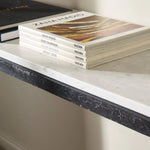 Featuring Hammered White Marble Iron Console Table by Four Hands at Amethyst Home. An open console table pairs a hand-hammered black iron base with a smooth white marble top, crafting a minimalist look with contrast. An open design creates endless possibilities for your media display and storage, or even styled in an entryway. Overall Dimensions: 78.00"w x . Amethyst Home provides interior design, new home construction design consulting, vintage area rugs, and lighting in the San Diego metro area.