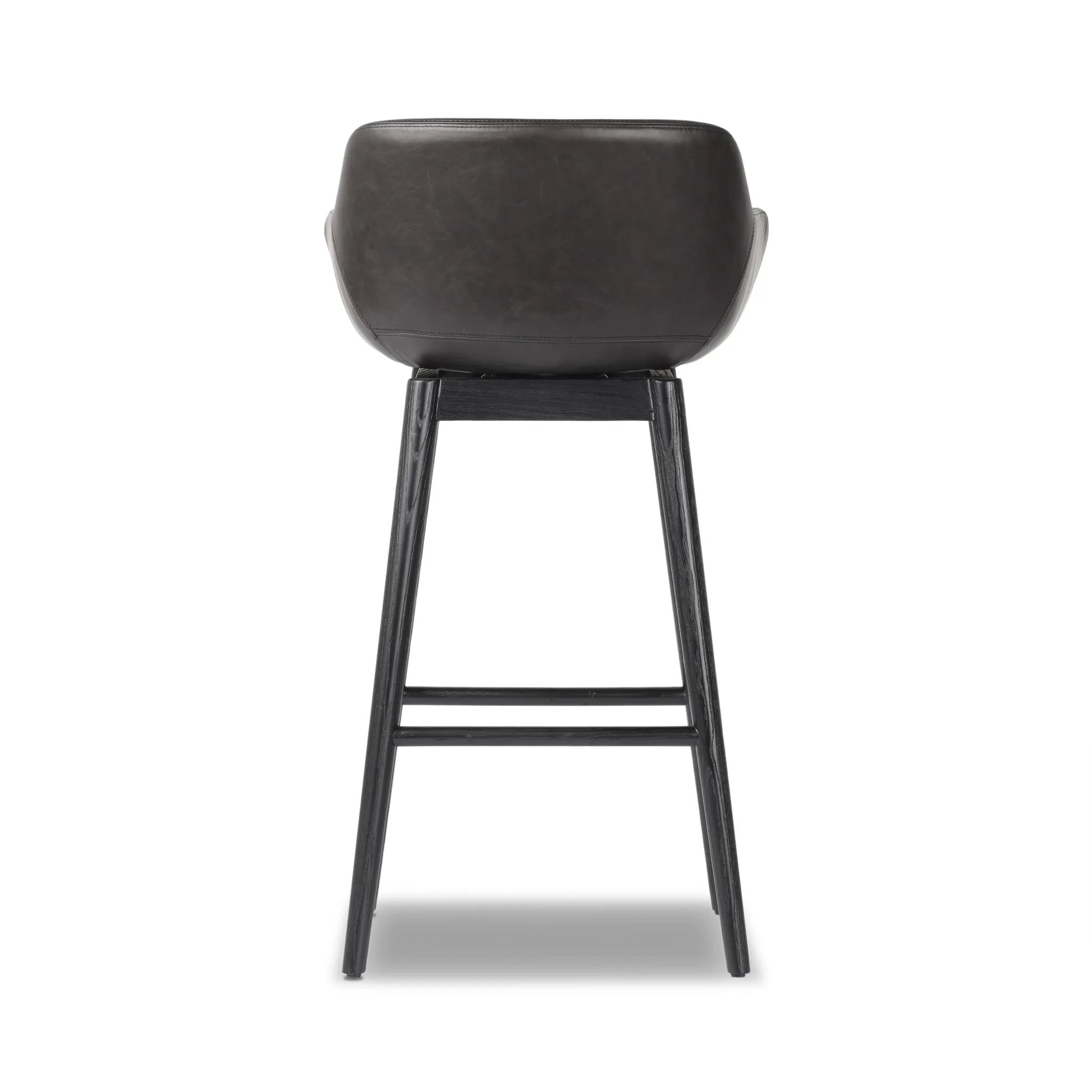 Featuring Hannah Sonoma Black Swivel Bar + Counter Stool by Four Hands at Amethyst Home. BarOverall Dimensions: 21.75"w x 20.50"d x 40.75"hWeight: 23.81 lbsCounterOverall Dimensions: 21.75"w x 20.50"d x 36.75"hWeight: 21.61 lbsMaterials: Top Grain Leather, Solid Oak, Solid Ash. Amethyst Home provides interior design, new home construction design consulting, vintage area rugs, and lighting in the Boston metro area.