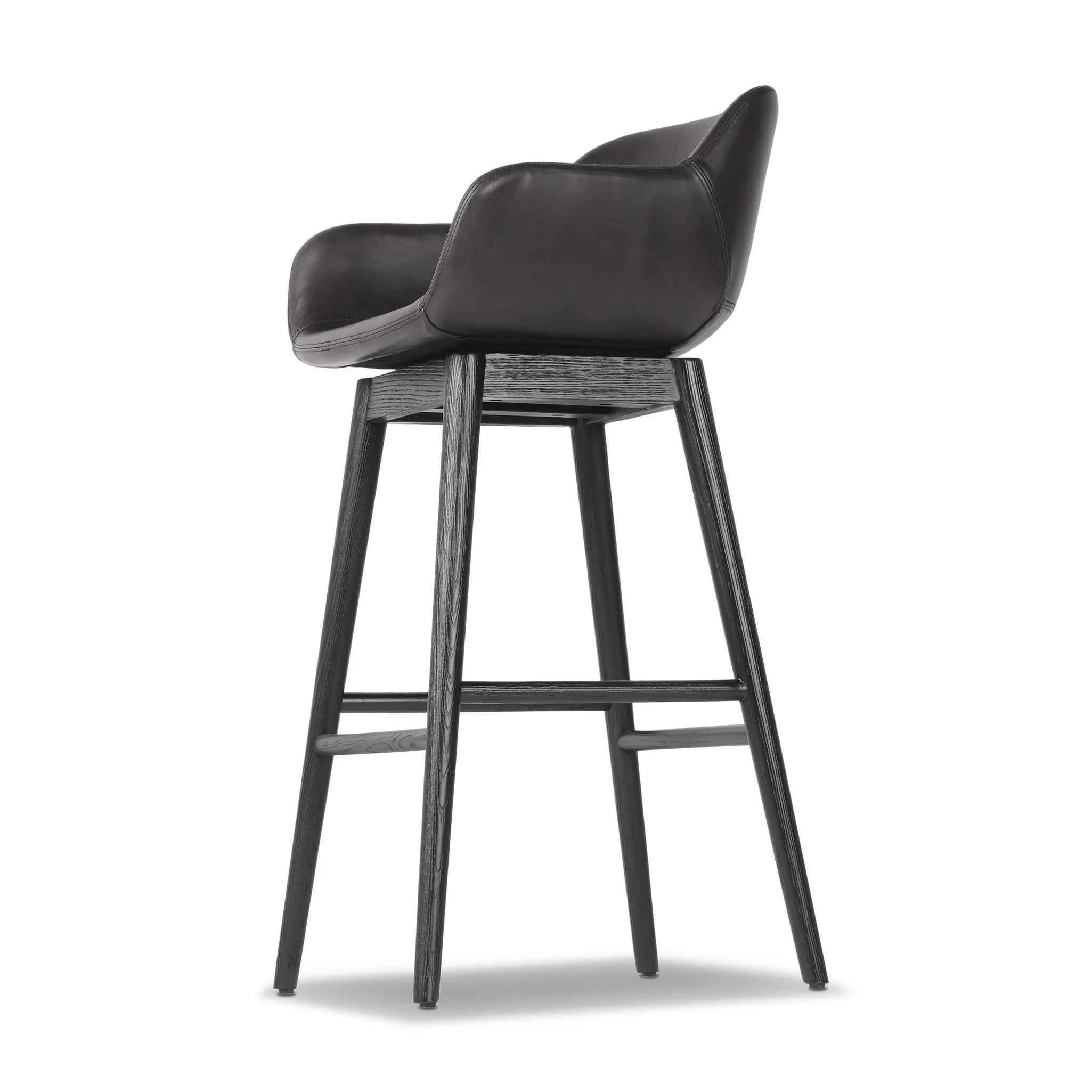 Featuring Hannah Sonoma Black Swivel Bar + Counter Stool by Four Hands at Amethyst Home. BarOverall Dimensions: 21.75"w x 20.50"d x 40.75"hWeight: 23.81 lbsCounterOverall Dimensions: 21.75"w x 20.50"d x 36.75"hWeight: 21.61 lbsMaterials: Top Grain Leather, Solid Oak, Solid Ash. Amethyst Home provides interior design, new home construction design consulting, vintage area rugs, and lighting in the Calabasas metro area.