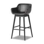 Featuring Hannah Sonoma Black Swivel Bar + Counter Stool by Four Hands at Amethyst Home. BarOverall Dimensions: 21.75"w x 20.50"d x 40.75"hWeight: 23.81 lbsCounterOverall Dimensions: 21.75"w x 20.50"d x 36.75"hWeight: 21.61 lbsMaterials: Top Grain Leather, Solid Oak, Solid Ash. Amethyst Home provides interior design, new home construction design consulting, vintage area rugs, and lighting in the Dallas metro area.