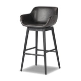 Featuring Hannah Sonoma Black Swivel Bar + Counter Stool by Four Hands at Amethyst Home. BarOverall Dimensions: 21.75"w x 20.50"d x 40.75"hWeight: 23.81 lbsCounterOverall Dimensions: 21.75"w x 20.50"d x 36.75"hWeight: 21.61 lbsMaterials: Top Grain Leather, Solid Oak, Solid Ash. Amethyst Home provides interior design, new home construction design consulting, vintage area rugs, and lighting in the Dallas metro area.