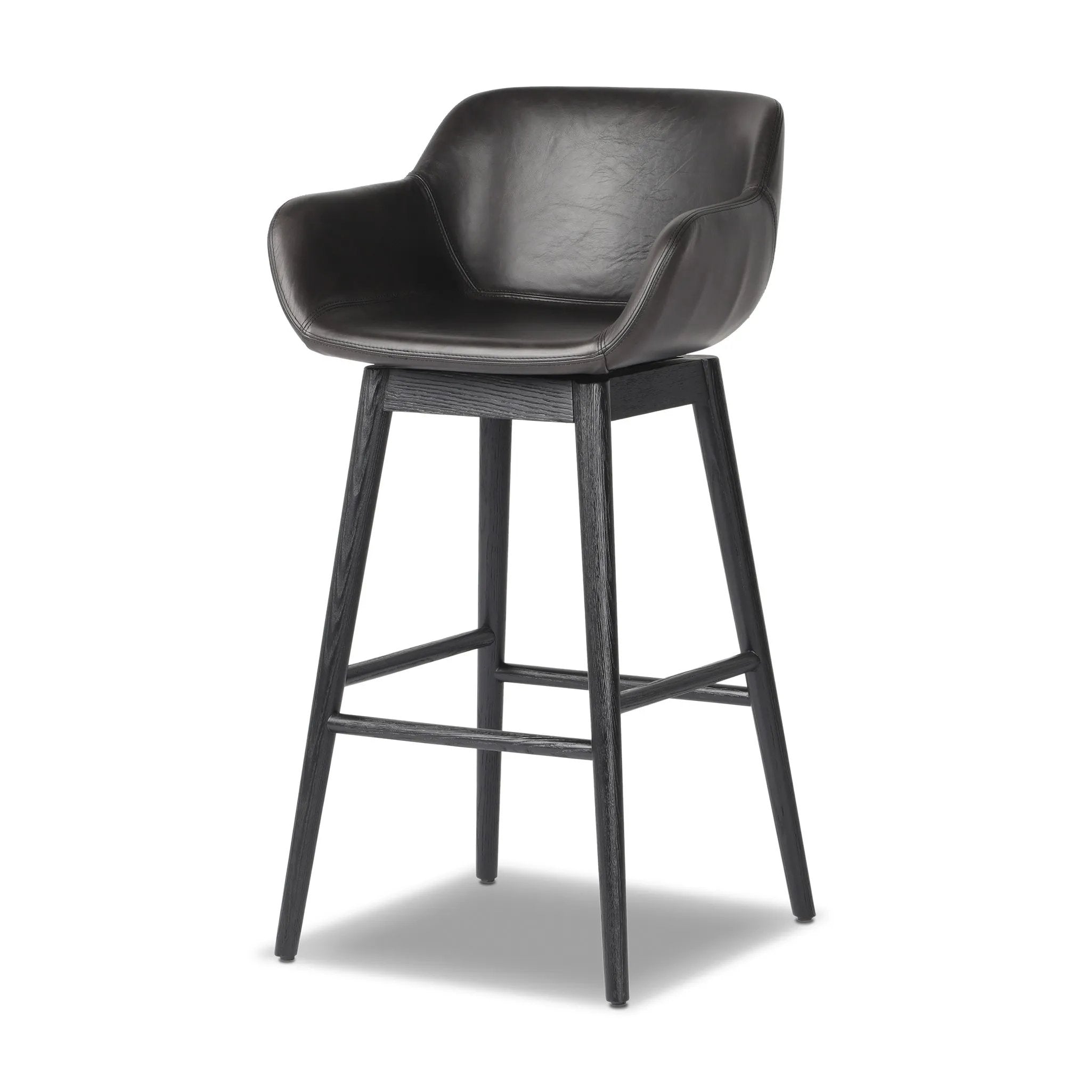 Featuring Hannah Sonoma Black Swivel Bar + Counter Stool by Four Hands at Amethyst Home. BarOverall Dimensions: 21.75"w x 20.50"d x 40.75"hWeight: 23.81 lbsCounterOverall Dimensions: 21.75"w x 20.50"d x 36.75"hWeight: 21.61 lbsMaterials: Top Grain Leather, Solid Oak, Solid Ash. Amethyst Home provides interior design, new home construction design consulting, vintage area rugs, and lighting in the Dallas metro area.