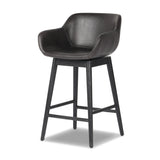 Featuring Hannah Sonoma Black Swivel Bar + Counter Stool by Four Hands at Amethyst Home. BarOverall Dimensions: 21.75"w x 20.50"d x 40.75"hWeight: 23.81 lbsCounterOverall Dimensions: 21.75"w x 20.50"d x 36.75"hWeight: 21.61 lbsMaterials: Top Grain Leather, Solid Oak, Solid Ash. Amethyst Home provides interior design, new home construction design consulting, vintage area rugs, and lighting in the Nashville metro area.