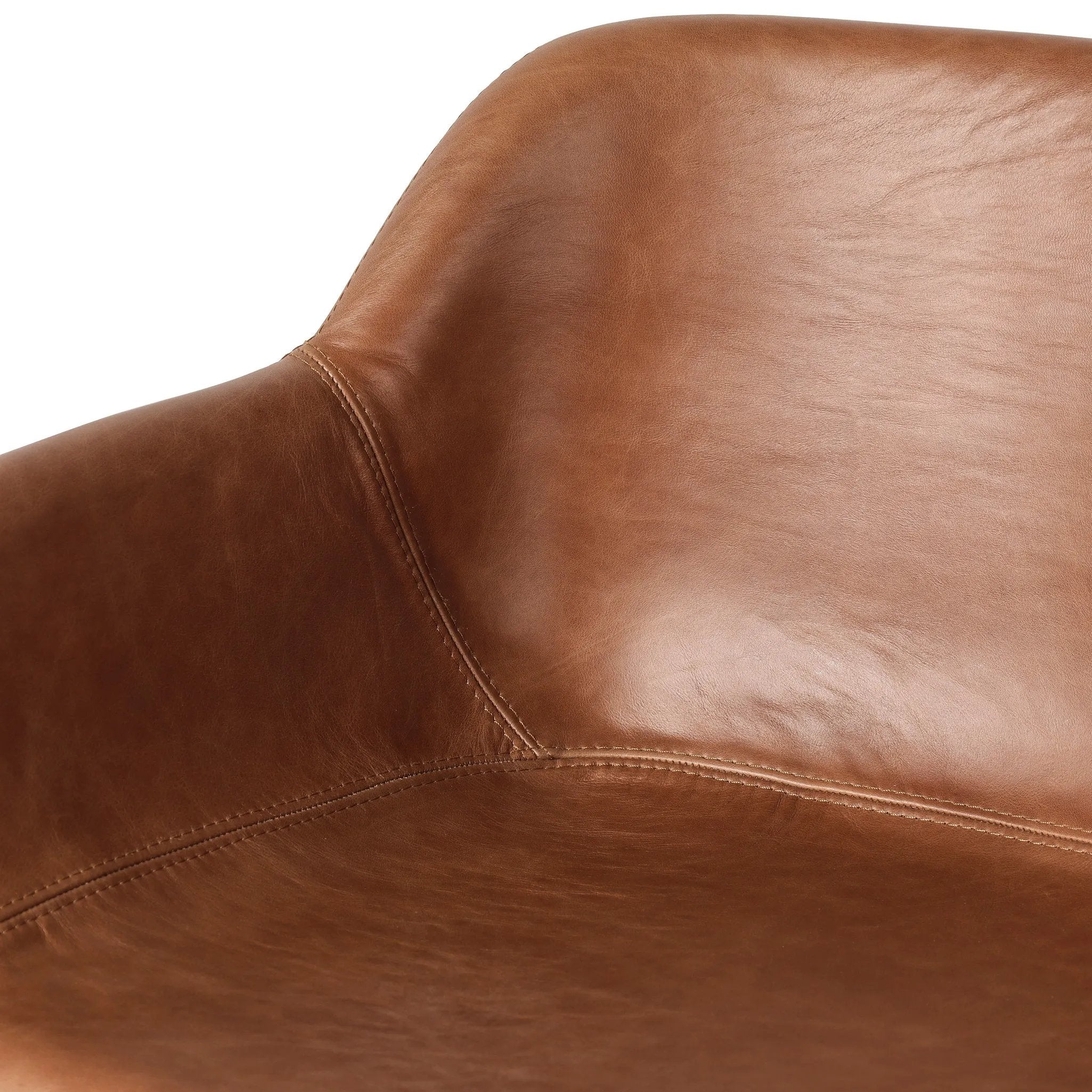 A midcentury-inspired counter stool gets refreshed with a modern memory swivel and chestnut top-grain leather. Slim, tapered oak legs balance a curved seat Amethyst Home provides interior design, new home construction design consulting, vintage area rugs, and lighting in the Des Moines metro area.