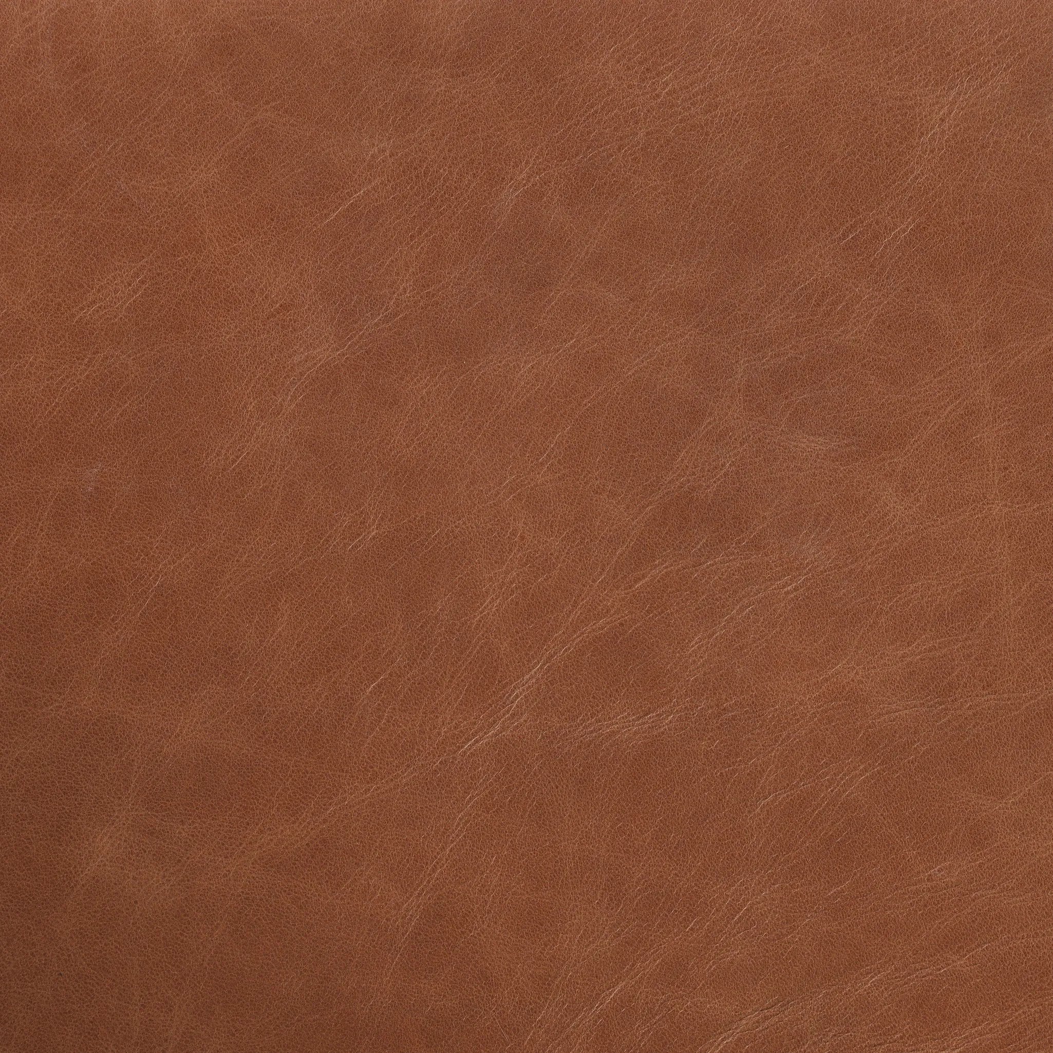 A midcentury-inspired counter stool gets refreshed with a modern memory swivel and chestnut top-grain leather. Slim, tapered oak legs balance a curved seat Amethyst Home provides interior design, new home construction design consulting, vintage area rugs, and lighting in the Scottsdale metro area.