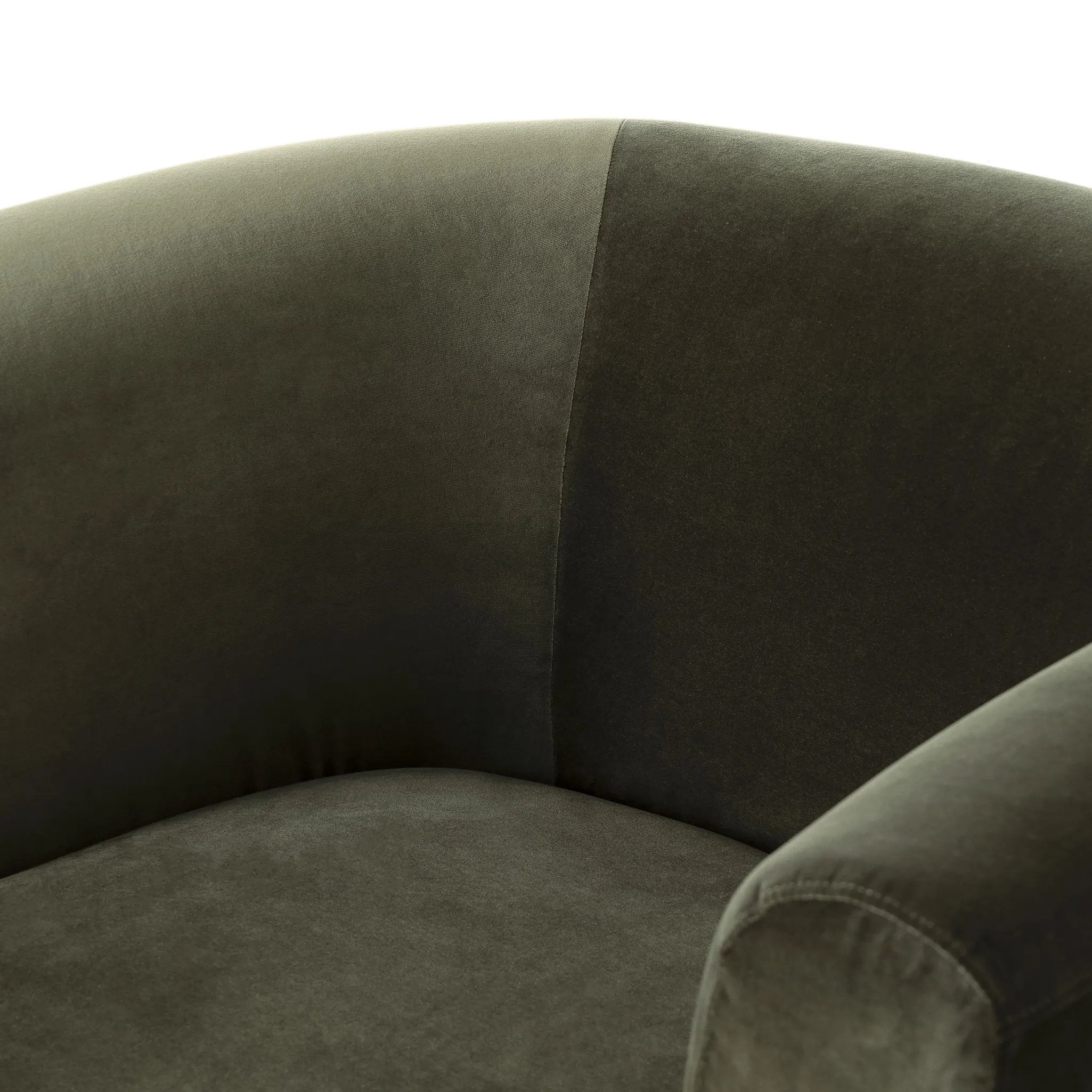 A true showstopper. A fully upholstered outer frame cradles this classic chair upholstered in a velvety olive fabric Amethyst Home provides interior design, new home construction design consulting, vintage area rugs, and lighting in the Laguna Beach metro area.