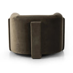 A true showstopper. A fully upholstered outer frame cradles this classic chair upholstered in a velvety olive fabric Amethyst Home provides interior design, new home construction design consulting, vintage area rugs, and lighting in the Park City metro area.