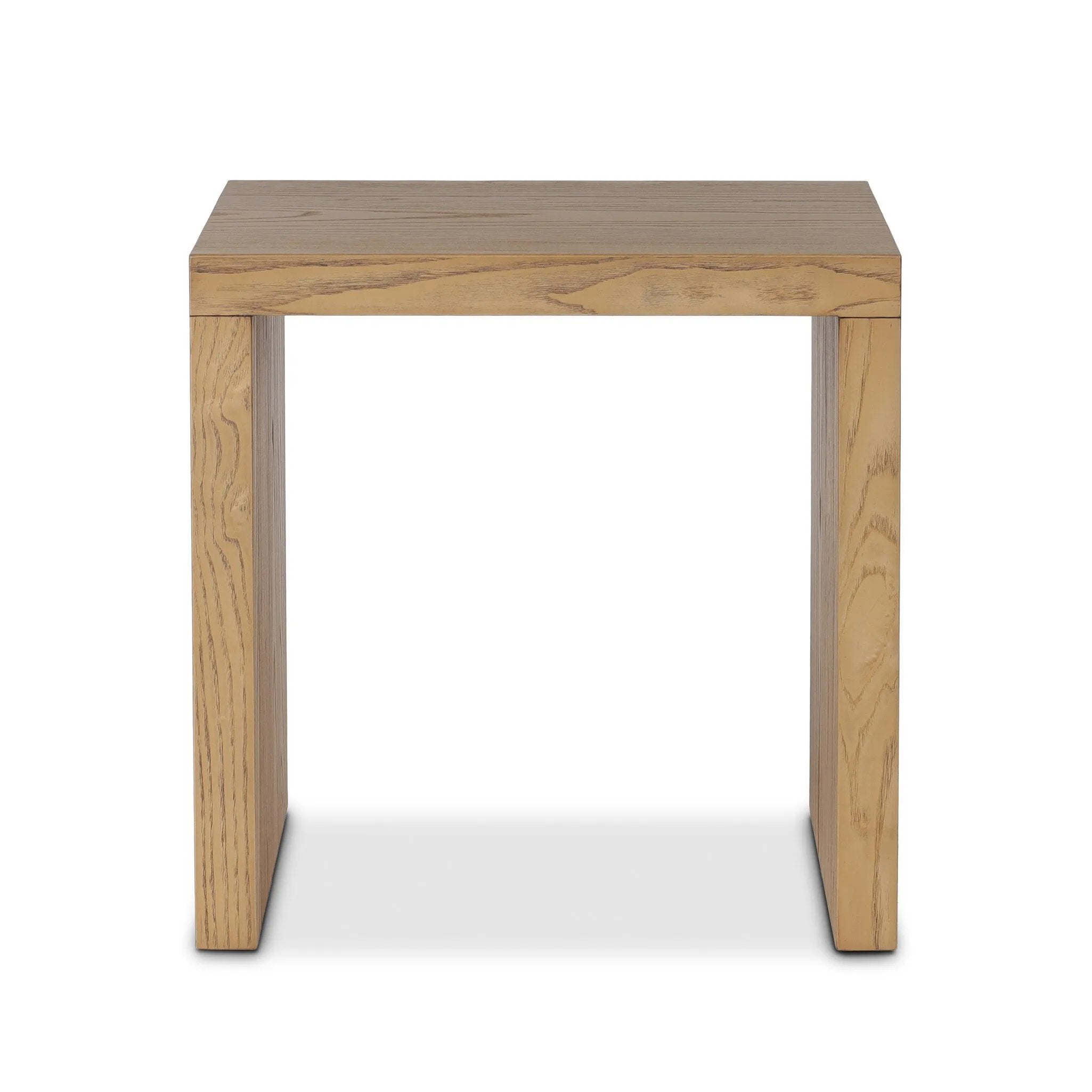 Simple waterfall shaping defined by subtle details. Grain-rich ash offers plenty of movement across the wood, meeting in a prominent scallop cutout detail on each edge for a bold addition of character to this end table. A design collaboration by Amber Lewis and Four Hands. Amethyst Home provides interior design, new home construction design consulting, vintage area rugs, and lighting in the Portland metro area.