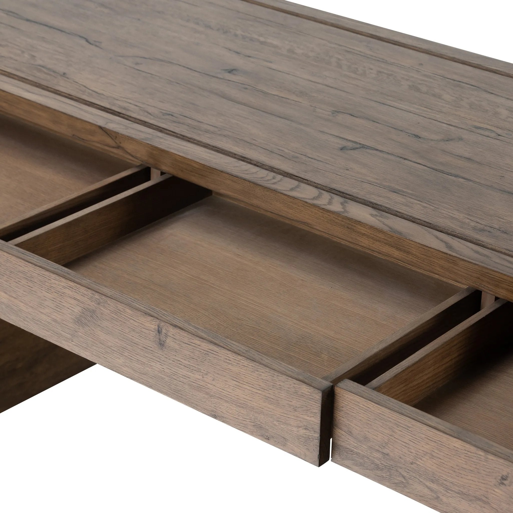 Featuring Henry Rustic Grey Veneer Desk by Four Hands at Amethyst Home. Made from solid reclaimed oak finished in a rustic grey, this slim-profile desk shapes subtly curved corners, bringing a handcrafted look to a minimalist form. Designed in partnership with longtime Four Hands collaborator Thomas Bina and Brazilian designer Ronald Sasson.Overall Dimensions:. Amethyst Home provides interior design, new home construction design consulting, vintage area rugs, and lighting in the Boston metro area.