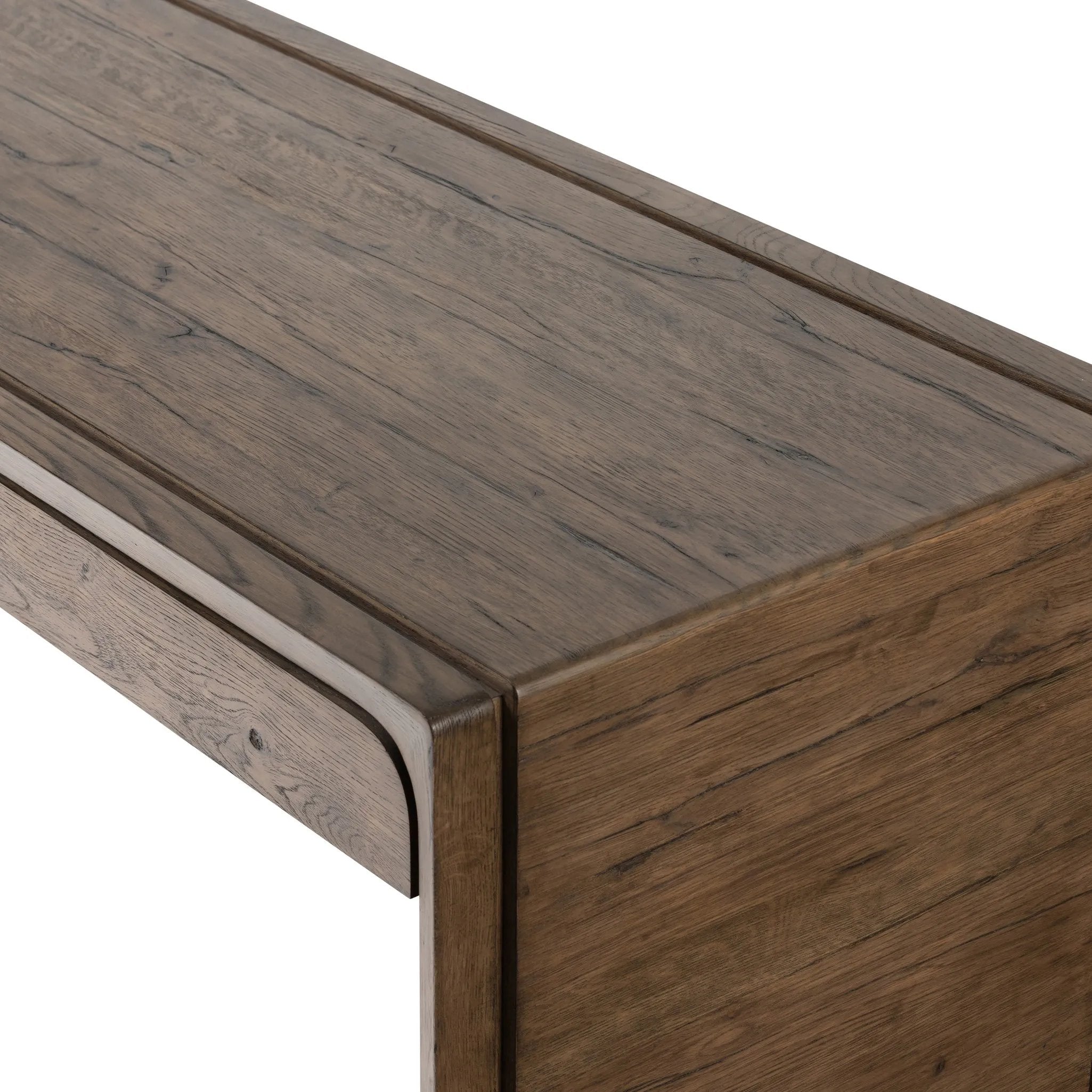 Featuring Henry Rustic Grey Veneer Desk by Four Hands at Amethyst Home. Made from solid reclaimed oak finished in a rustic grey, this slim-profile desk shapes subtly curved corners, bringing a handcrafted look to a minimalist form. Designed in partnership with longtime Four Hands collaborator Thomas Bina and Brazilian designer Ronald Sasson.Overall Dimensio. Amethyst Home provides interior design, new home construction design consulting, vintage area rugs, and lighting in the Calabasas metro area.