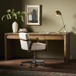 Featuring Henry Rustic Grey Veneer Desk by Four Hands at Amethyst Home. Made from solid reclaimed oak finished in a rustic grey, this slim-profile desk shapes subtly curved corners, bringing a handcrafted look to a minimalist form. Designed in partnership with longtime Four Hands collaborator Thomas Bina and Brazilian designer Ronald Sasson.Overall Dimens. Amethyst Home provides interior design, new home construction design consulting, vintage area rugs, and lighting in the Kansas City metro area.