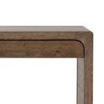 Featuring Henry Rustic Grey Veneer Desk by Four Hands at Amethyst Home. Made from solid reclaimed oak finished in a rustic grey, this slim-profile desk shapes subtly curved corners, bringing a handcrafted look to a minimalist form. Designed in partnership with longtime Four Hands collaborator Thomas Bina and Brazilian designer Ronald Sasson.Overall Dimensions: . Amethyst Home provides interior design, new home construction design consulting, vintage area rugs, and lighting in the Omaha metro area.