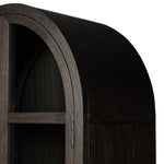 Featuring Hepburn Dark Anthracite Oak Veneer Cabinet by Four Hands at Amethyst Home. Beautifully arched with a flush plinth base, a versatile oak cabinet features a dark, rich finish. With generous interior shelving, a tempered glass front allows you to showcase favorite books and treasures — letting anyone who enters your space know exactly who you ar. Amethyst Home provides interior design, new home construction design consulting, vintage area rugs, and lighting in the Salt Lake City metro area.