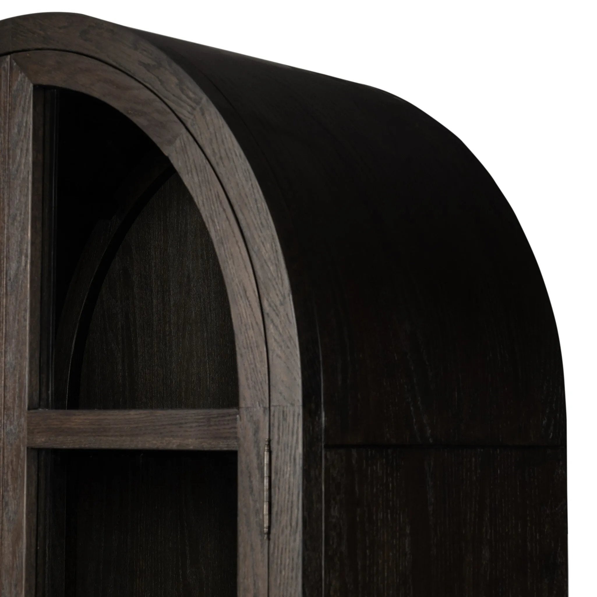 Featuring Hepburn Dark Anthracite Oak Veneer Cabinet by Four Hands at Amethyst Home. Beautifully arched with a flush plinth base, a versatile oak cabinet features a dark, rich finish. With generous interior shelving, a tempered glass front allows you to showcase favorite books and treasures — letting anyone who enters your space know exactly who you ar. Amethyst Home provides interior design, new home construction design consulting, vintage area rugs, and lighting in the Salt Lake City metro area.