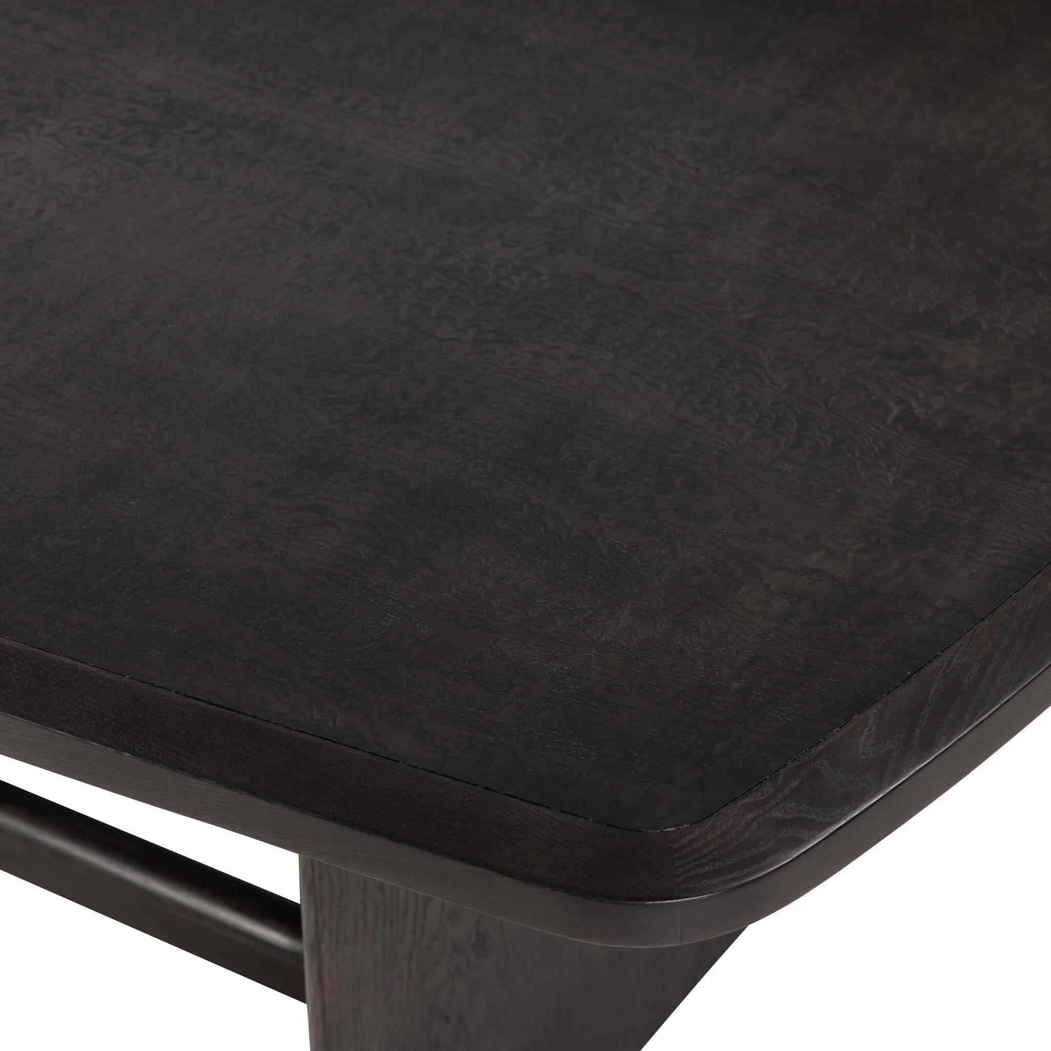 A timeless piece further elevated by its unique finish. Tark finish stops short of fully penetratung the wood, resulting in a beautiful, subtly plum-colored hue.As lovers of luxe materials at Amethyst, we love the optimistic inspired Hera Dining Table - Dark Tamo Ash. Amethyst Home provides interior design, new home construction design consulting, vintage area rugs, and lighting in the Tampa metro area.