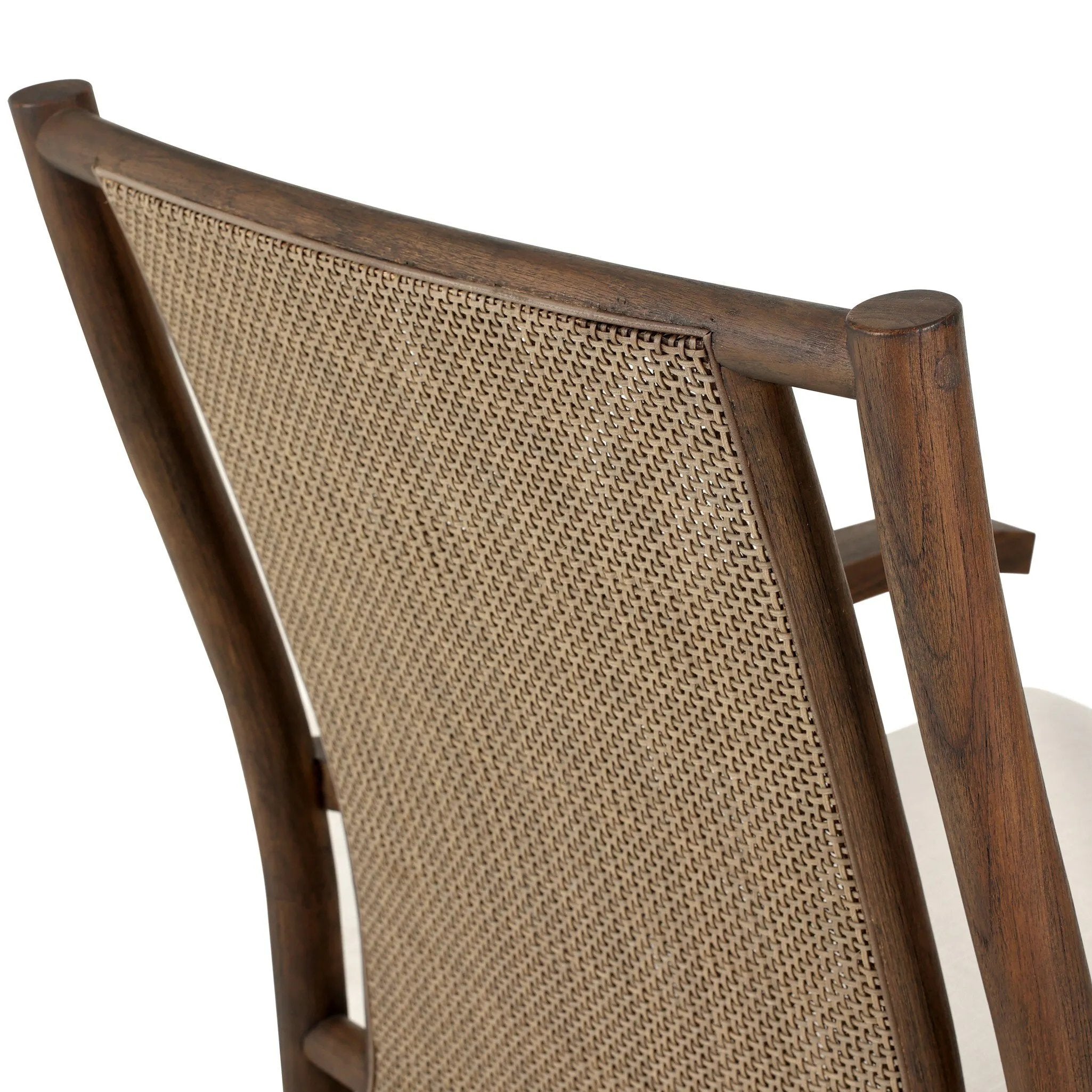 Bring the antique look to the outdoors with this vintage-style outdoor rocking chair. Paired back details let the FSC®-certified teak frame, crosshatch cane panel back and sink-in cushioned seat tell a story of comfort and character. Cover or store inside during inclement weather and when not in use. Amethyst Home provides interior design, new home construction design consulting, vintage area rugs, and lighting in the Park City metro area.