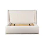 Angled wings anchor the sides of this reimagined shelter bed, grounding an upholstered bed frame. Off-white Crypton® performance fabric covers all-around cushioning. Crypton® performance fabric is specially engineered for protection against stains, moisture and odor Amethyst Home provides interior design, new home construction design consulting, vintage area rugs, and lighting in the Alpharetta metro area.