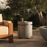 This outdoor propane tank enclosure pairs with fire tables for a clean, seamless look. Made from glass-reinforced concrete, each piece is naturally finished with deep tones of pewter and dark grey. It can act as an end table with its lid on, and has cutouts at the base for hose attachments. Amethyst Home provides interior design, new home construction design consulting, vintage area rugs, and lighting in the Monterey metro area.