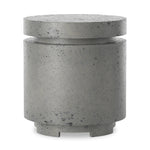 This outdoor propane tank enclosure pairs with fire tables for a clean, seamless look. Made from glass-reinforced concrete, each piece is naturally finished with deep tones of pewter and dark grey. It can act as an end table with its lid on, and has cutouts at the base for hose attachments. Amethyst Home provides interior design, new home construction design consulting, vintage area rugs, and lighting in the San Diego metro area.