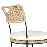 A light, airy take on the traditional bistro shape. This outdoor dining chair features exaggerated splayed legs and a curved X-shaped stretcher, with a handle detail cut out of the woven seat back. Finished with a seat cushion. Cover or store indoors during inclement weather and when not in use. Amethyst Home provides interior design, new home construction design consulting, vintage area rugs, and lighting in the Charlotte metro area.