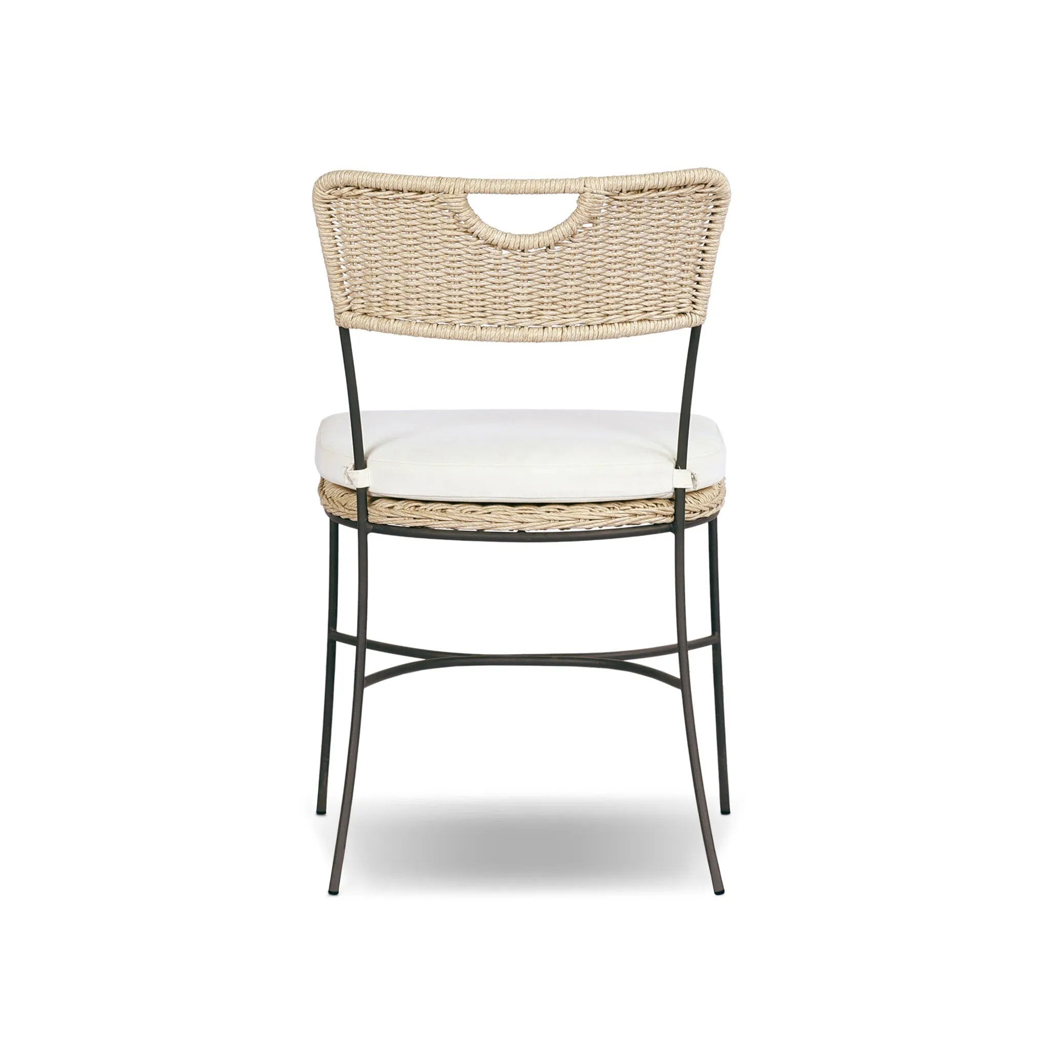 A light, airy take on the traditional bistro shape. This outdoor dining chair features exaggerated splayed legs and a curved X-shaped stretcher, with a handle detail cut out of the woven seat back. Finished with a seat cushion. Cover or store indoors during inclement weather and when not in use. Amethyst Home provides interior design, new home construction design consulting, vintage area rugs, and lighting in the Des Moines metro area.