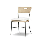 A light, airy take on the traditional bistro shape. This outdoor dining chair features exaggerated splayed legs and a curved X-shaped stretcher, with a handle detail cut out of the woven seat back. Finished with a seat cushion. Cover or store indoors during inclement weather and when not in use. Amethyst Home provides interior design, new home construction design consulting, vintage area rugs, and lighting in the Nashville metro area.