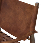 Featuring Ignacio Renault Cognac Chair by Four Hands at Amethyst Home. Reviving a vintage-inspired frame, this leather sling chair meets retro character with laid-back comfort. The tan leather sling back, shaped like a shield, adds bold style, while the woven seat provides a supportive, unique seating experience. Crafted from an ash wood frame with dowel . Amethyst Home provides interior design, new home construction design consulting, vintage area rugs, and lighting in the Los Angeles metro area.