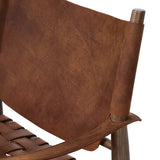 Featuring Ignacio Renault Cognac Chair by Four Hands at Amethyst Home. Reviving a vintage-inspired frame, this leather sling chair meets retro character with laid-back comfort. The tan leather sling back, shaped like a shield, adds bold style, while the woven seat provides a supportive, unique seating experience. Crafted from an ash wood frame with dowel . Amethyst Home provides interior design, new home construction design consulting, vintage area rugs, and lighting in the Los Angeles metro area.