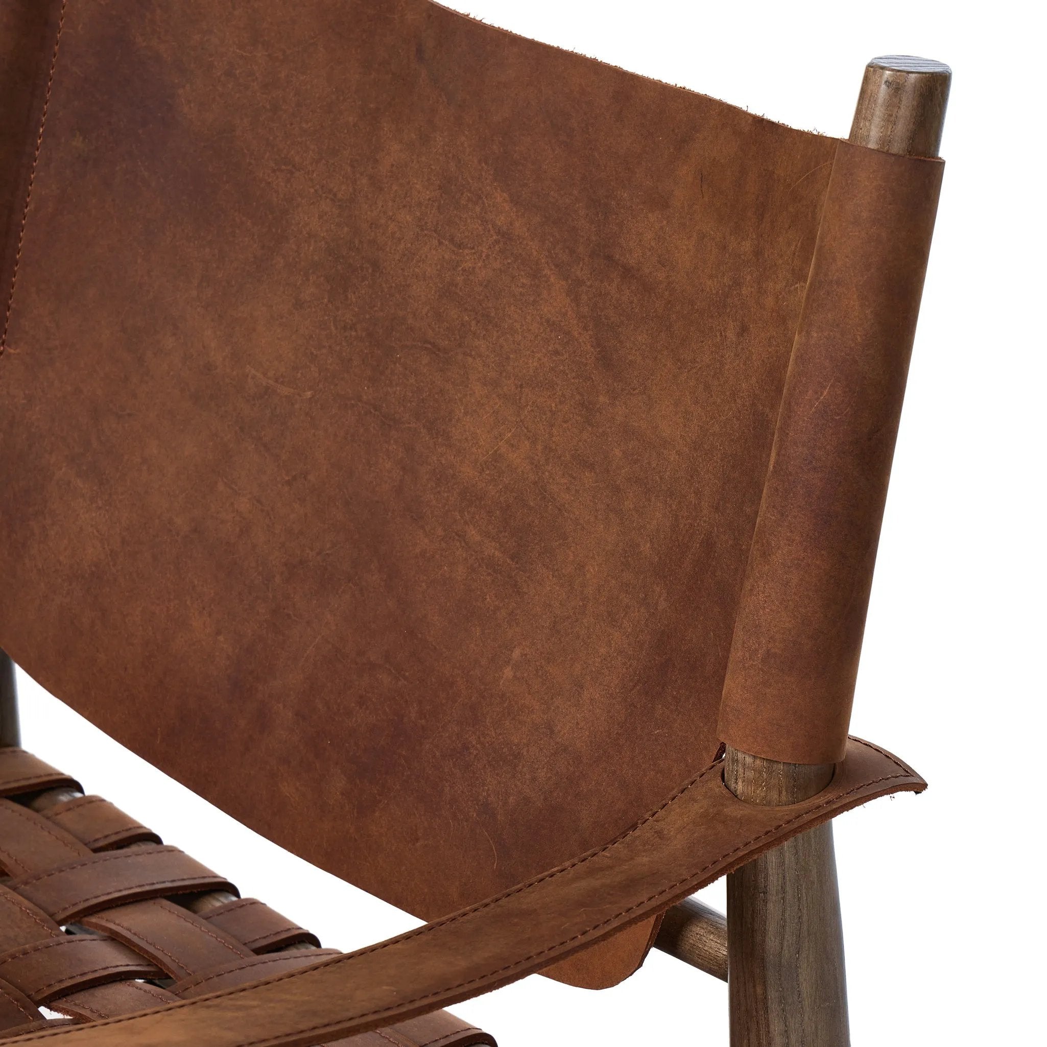 Featuring Ignacio Renault Cognac Chair by Four Hands at Amethyst Home. Reviving a vintage-inspired frame, this leather sling chair meets retro character with laid-back comfort. The tan leather sling back, shaped like a shield, adds bold style, while the woven seat provides a supportive, unique seating experience. Crafted from an ash wood frame with dowel . Amethyst Home provides interior design, new home construction design consulting, vintage area rugs, and lighting in the Los Angeles metro area.