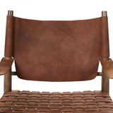 Featuring Ignacio Renault Cognac Chair by Four Hands at Amethyst Home. Reviving a vintage-inspired frame, this leather sling chair meets retro character with laid-back comfort. The tan leather sling back, shaped like a shield, adds bold style, while the woven seat provides a supportive, unique seating experience. Crafted from an ash wood frame with dow. Amethyst Home provides interior design, new home construction design consulting, vintage area rugs, and lighting in the Salt Lake City metro area.