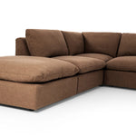 Inflated, pillow-inspired cushioning all around brings cozy comfort to the room. High-performance linen offers the best of both worlds on this plush and welcoming sectional. Amethyst Home provides interior design, new home construction design consulting, vintage area rugs, and lighting in the Calabasas metro area.