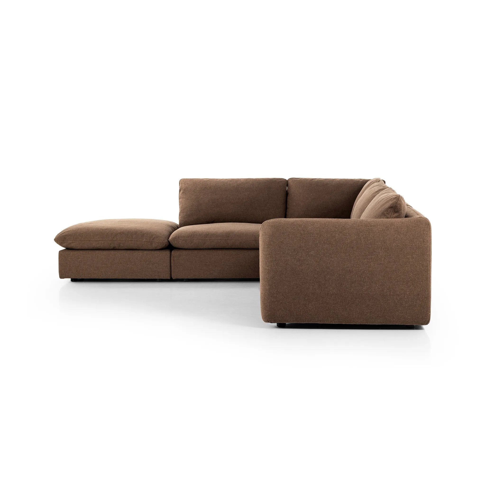 Inflated, pillow-inspired cushioning all around brings cozy comfort to the room. High-performance linen offers the best of both worlds on this plush and welcoming sectional. Amethyst Home provides interior design, new home construction design consulting, vintage area rugs, and lighting in the Dallas metro area.