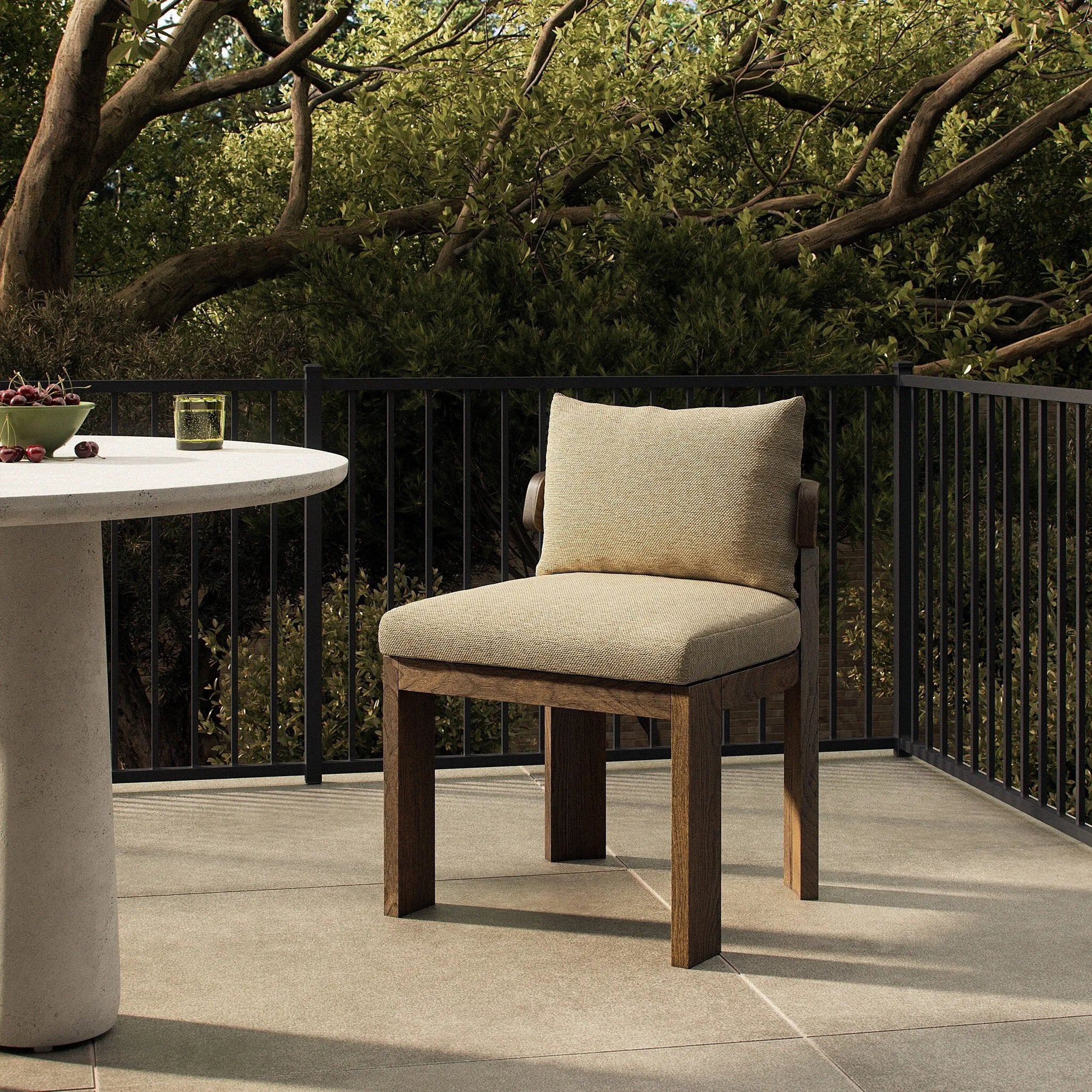 Warm beige upholstery and FSC®-certified teak framing form a simple barrel back outdoor dining chair, complemented by softened edges and a fluid shape for a classic look. Cover or store inside during inclement weather and when not in use. Amethyst Home provides interior design, new home construction design consulting, vintage area rugs, and lighting in the Calabasas metro area.