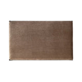 This French Industrialist-inspired cocktail ottoman features a curved stretcher base of bronzed hammered iron and a velvety seat in a versatile earth tone. Style with a sofa or sectional to create an extra surface in your living space, or for bonus seating. Amethyst Home provides interior design, new home construction design consulting, vintage area rugs, and lighting in the Seattle metro area.