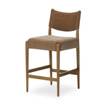A fresh take on midcentury styling, perfectly sized for the counter. Supportive back and seat cushions are upholstered in a soft, neutral fabric and framed out by toasted solid oak Amethyst Home provides interior design, new home construction design consulting, vintage area rugs, and lighting in the Portland metro area.