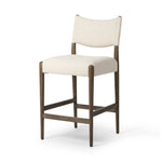 Featuring Jayla Antwerp Natural Stool by Four Hands at Amethyst Home. A midcetury-inspired piece, updated for modern times. A supportive back and seat cushion are upholstered in high-performance fabric, with walnut-finished wooden armrests prime for the head of the table. Perfectly sized for the counter. Steam regularly to keep fabric looking crisp. Perform. Amethyst Home provides interior design, new home construction design consulting, vintage area rugs, and lighting in the Nashville metro area.