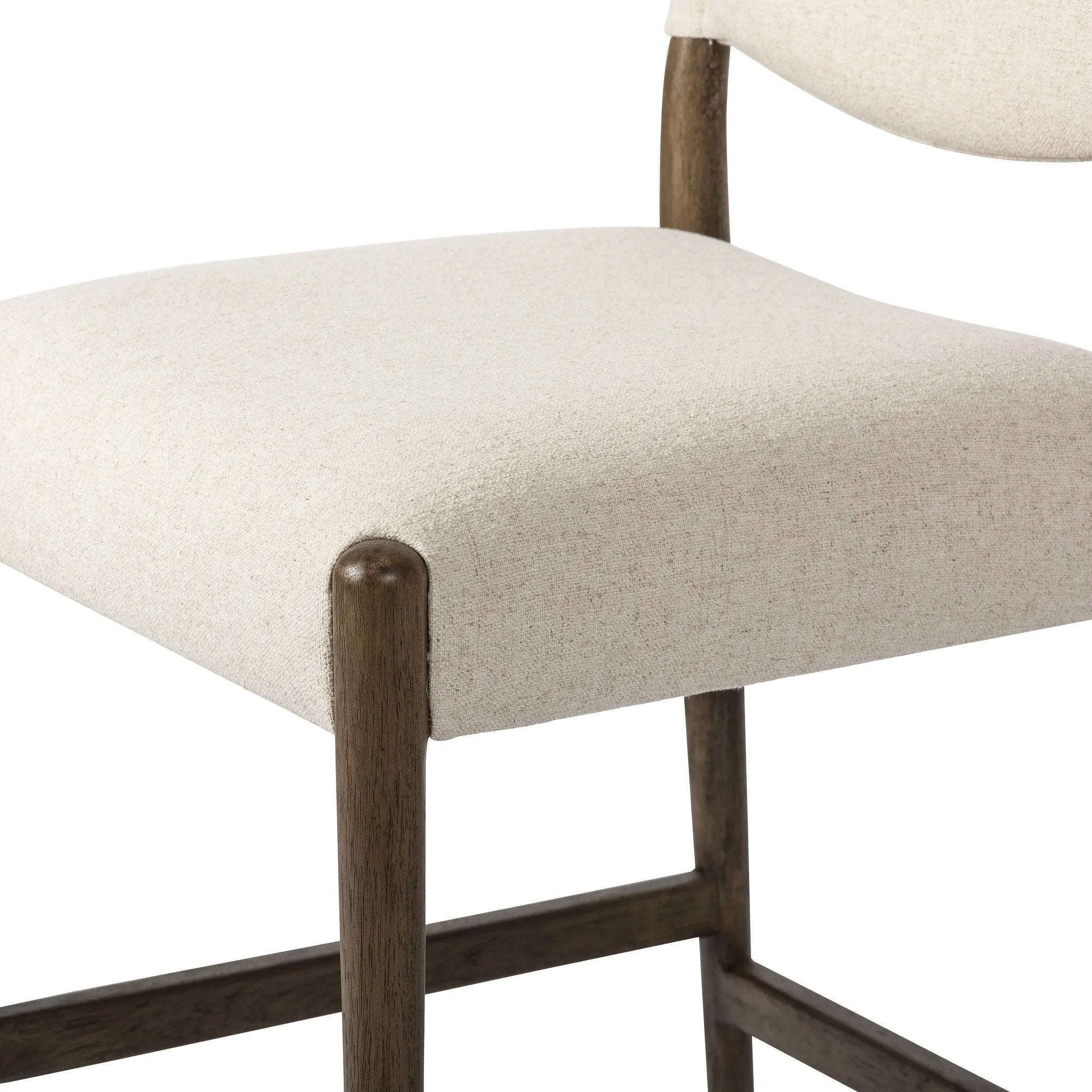 Featuring Jayla Antwerp Natural Stool by Four Hands at Amethyst Home. A midcetury-inspired piece, updated for modern times. A supportive back and seat cushion are upholstered in high-performance fabric, with walnut-finished wooden armrests prime for the head of the table. Perfectly sized for the counter. Steam regularly to keep fabric looking crisp. Perform. Amethyst Home provides interior design, new home construction design consulting, vintage area rugs, and lighting in the Park City metro area.