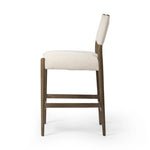 Featuring Jayla Antwerp Natural Stool by Four Hands at Amethyst Home. A midcetury-inspired piece, updated for modern times. A supportive back and seat cushion are upholstered in high-performance fabric, with walnut-finished wooden armrests prime for the head of the table. Perfectly sized for the counter. Steam regularly to keep fabric looking crisp. Performa. Amethyst Home provides interior design, new home construction design consulting, vintage area rugs, and lighting in the Portland metro area.