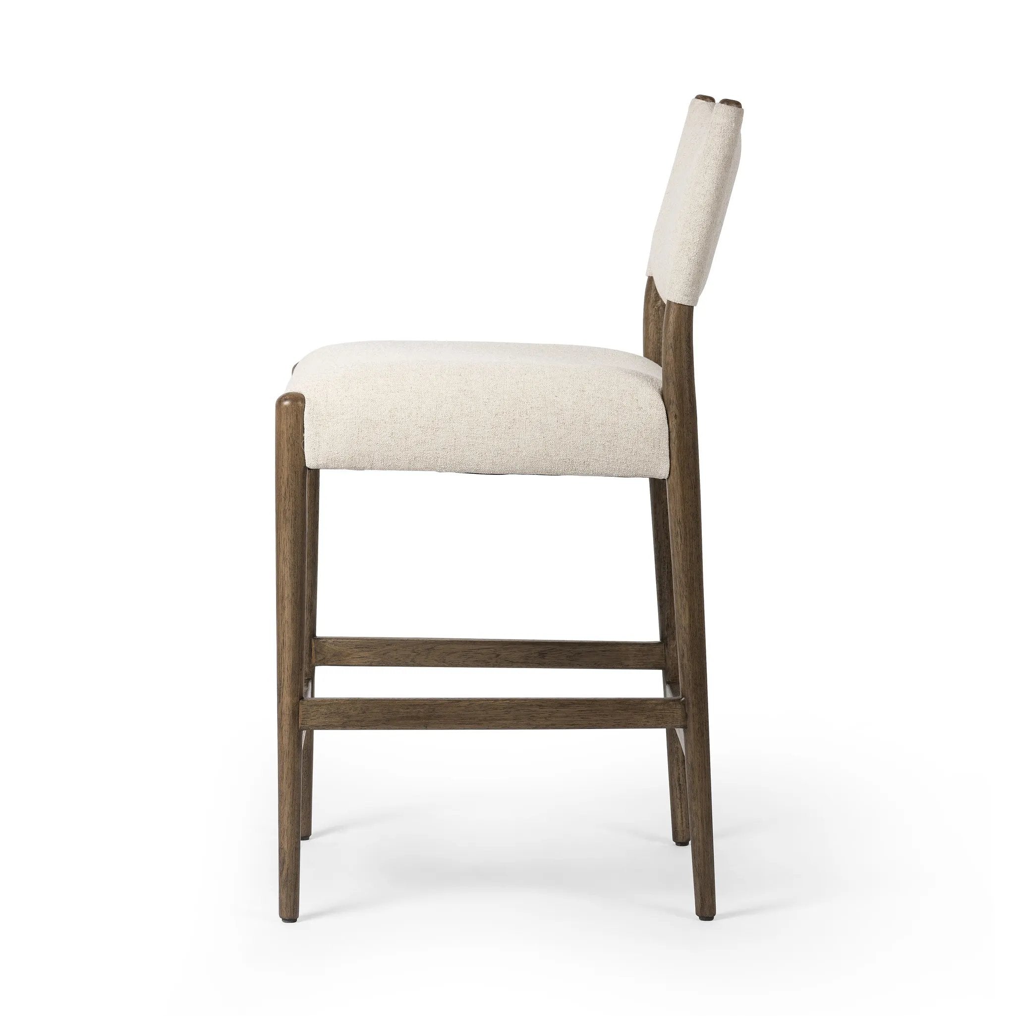 Featuring Jayla Antwerp Natural Stool by Four Hands at Amethyst Home. A midcetury-inspired piece, updated for modern times. A supportive back and seat cushion are upholstered in high-performance fabric, with walnut-finished wooden armrests prime for the head of the table. Perfectly sized for the counter. Steam regularly to keep fabric looking crisp. Performa. Amethyst Home provides interior design, new home construction design consulting, vintage area rugs, and lighting in the Portland metro area.