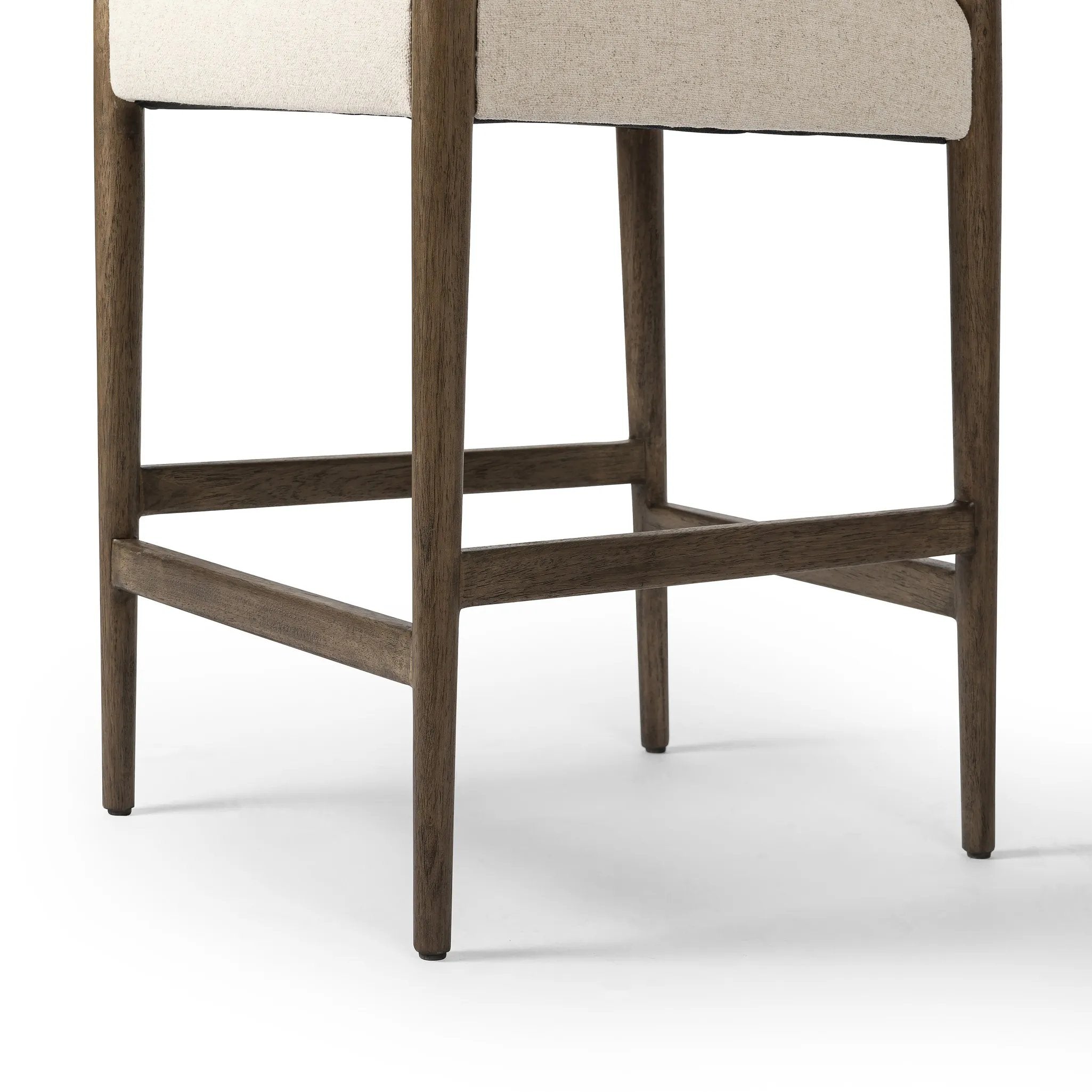 Featuring Jayla Antwerp Natural Stool by Four Hands at Amethyst Home. A midcetury-inspired piece, updated for modern times. A supportive back and seat cushion are upholstered in high-performance fabric, with walnut-finished wooden armrests prime for the head of the table. Perfectly sized for the counter. Steam regularly to keep fabric looking crisp. Perfor. Amethyst Home provides interior design, new home construction design consulting, vintage area rugs, and lighting in the Scottsdale metro area.