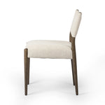A midcentury-inspired piece, updated for modern times. A supportive back and seat cushion are upholstered in high-performance fabric, with a walnut-finished frame for a contrast of color. Steam regularly to keep fabric looking crisp. Amethyst Home provides interior design, new home construction design consulting, vintage area rugs, and lighting in the Des Moines metro area.