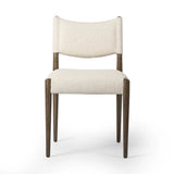 A midcentury-inspired piece, updated for modern times. A supportive back and seat cushion are upholstered in high-performance fabric, with a walnut-finished frame for a contrast of color. Steam regularly to keep fabric looking crisp. Amethyst Home provides interior design, new home construction design consulting, vintage area rugs, and lighting in the Kansas City metro area.