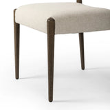 A midcentury-inspired piece, updated for modern times. A supportive back and seat cushion are upholstered in high-performance fabric, with a walnut-finished frame for a contrast of color. Steam regularly to keep fabric looking crisp. Amethyst Home provides interior design, new home construction design consulting, vintage area rugs, and lighting in the Newport Beach metro area.